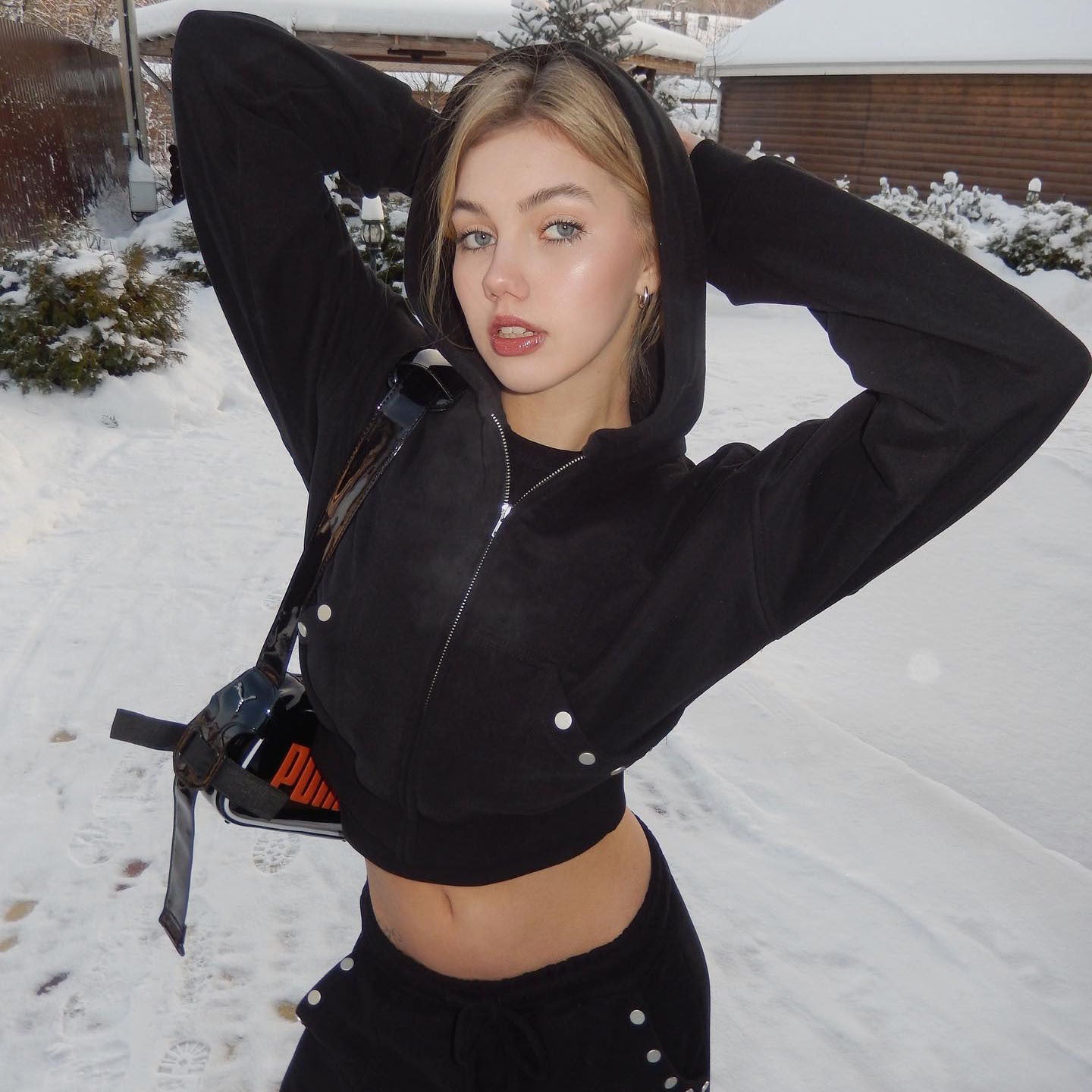 Women's sporty cropped hoodie with innovative snap button details NOVAE