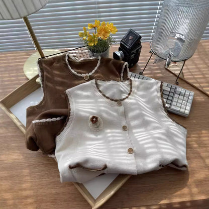 Women's knitted vest with contrasting details and pockets NOVAE