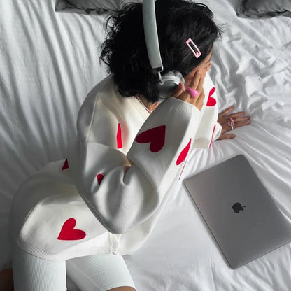 Women's comfortable sweatshirt with heart motif and relaxed fit NOVAE