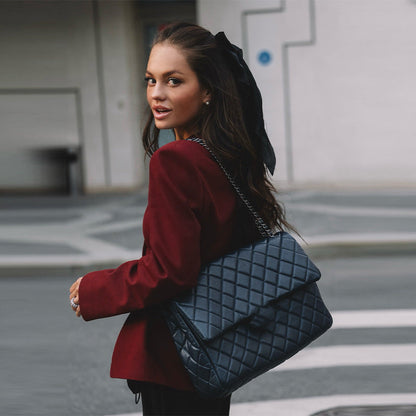 Women's fashionable blazer with a tailored cut and elegant button details NOVAE