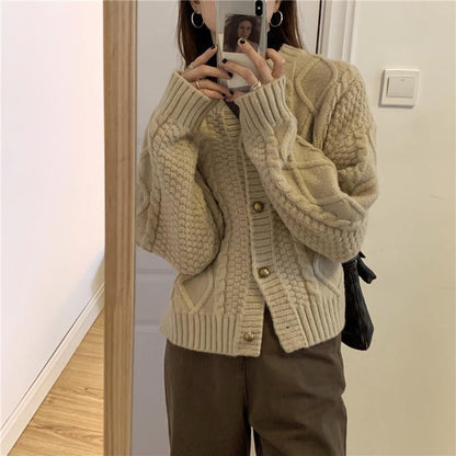 Women's chunky knit cardigan with button details and cable pattern NOVAE