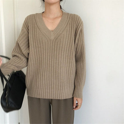 Women's viscose knit sweater with V-neck and ribbed design NOVAE