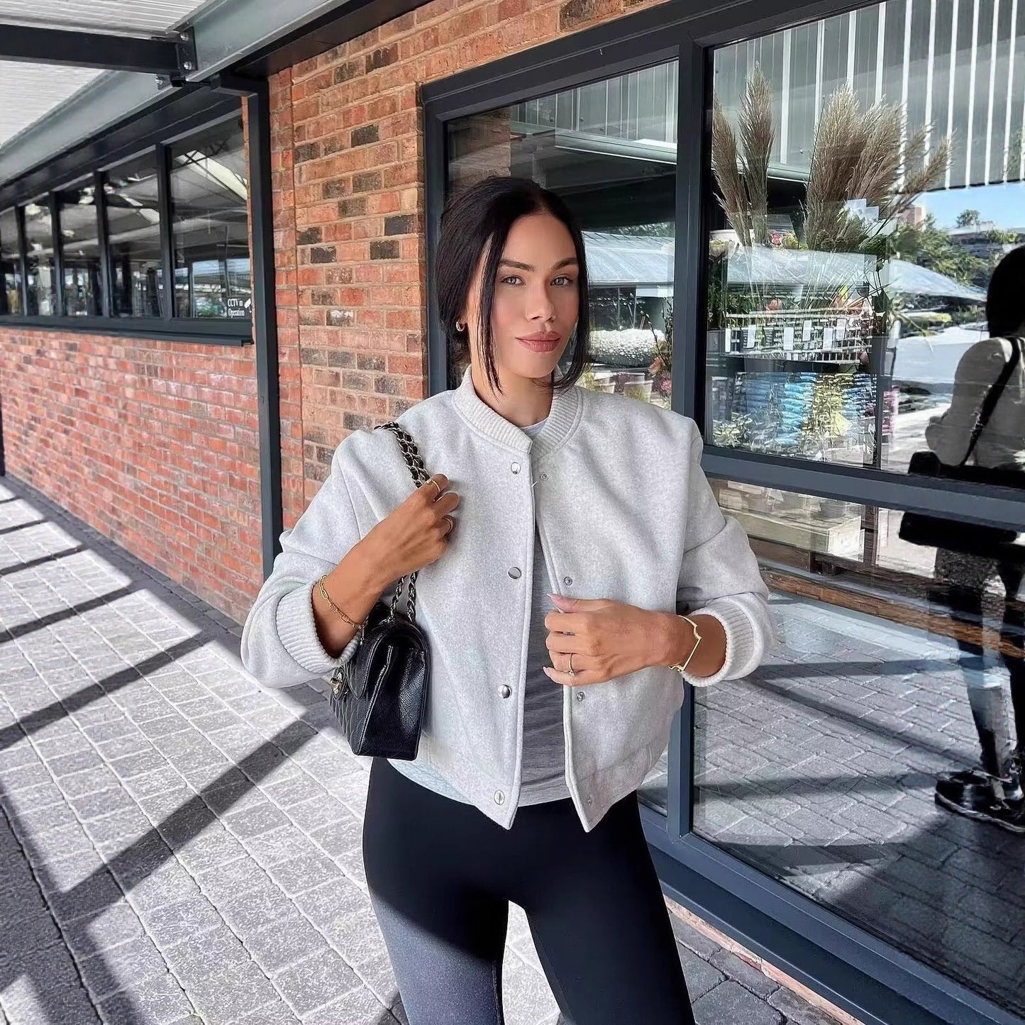 Women's fashionable sweatshirt jacket with button closure and practical pockets NOVAE