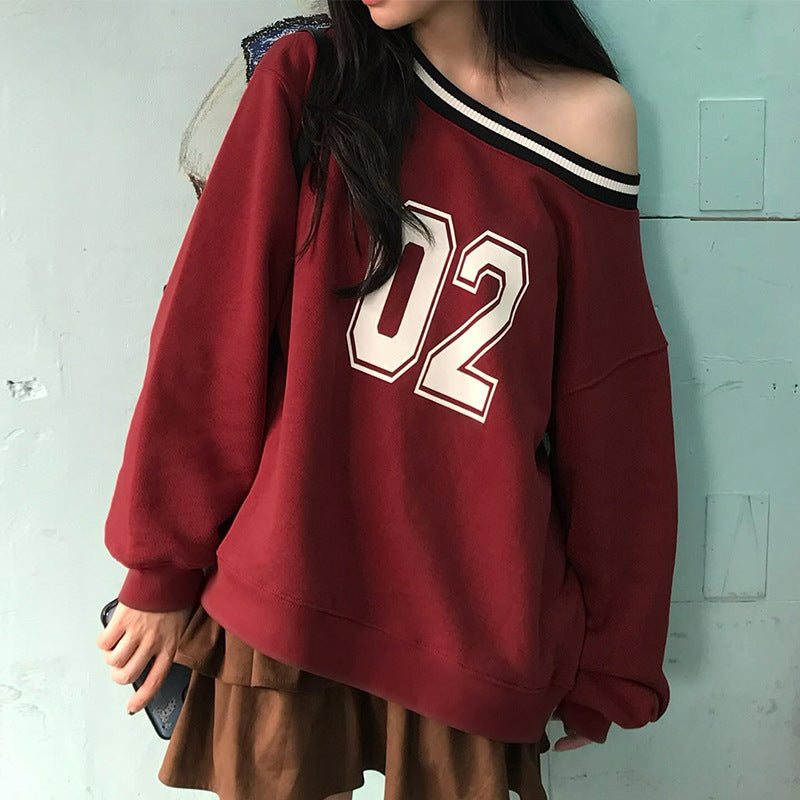 Women's casual oversized sweater with sporty print NOVAE
