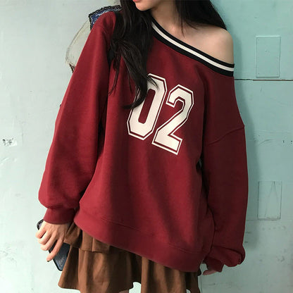 Women's casual oversized sweater with sporty print NOVAE