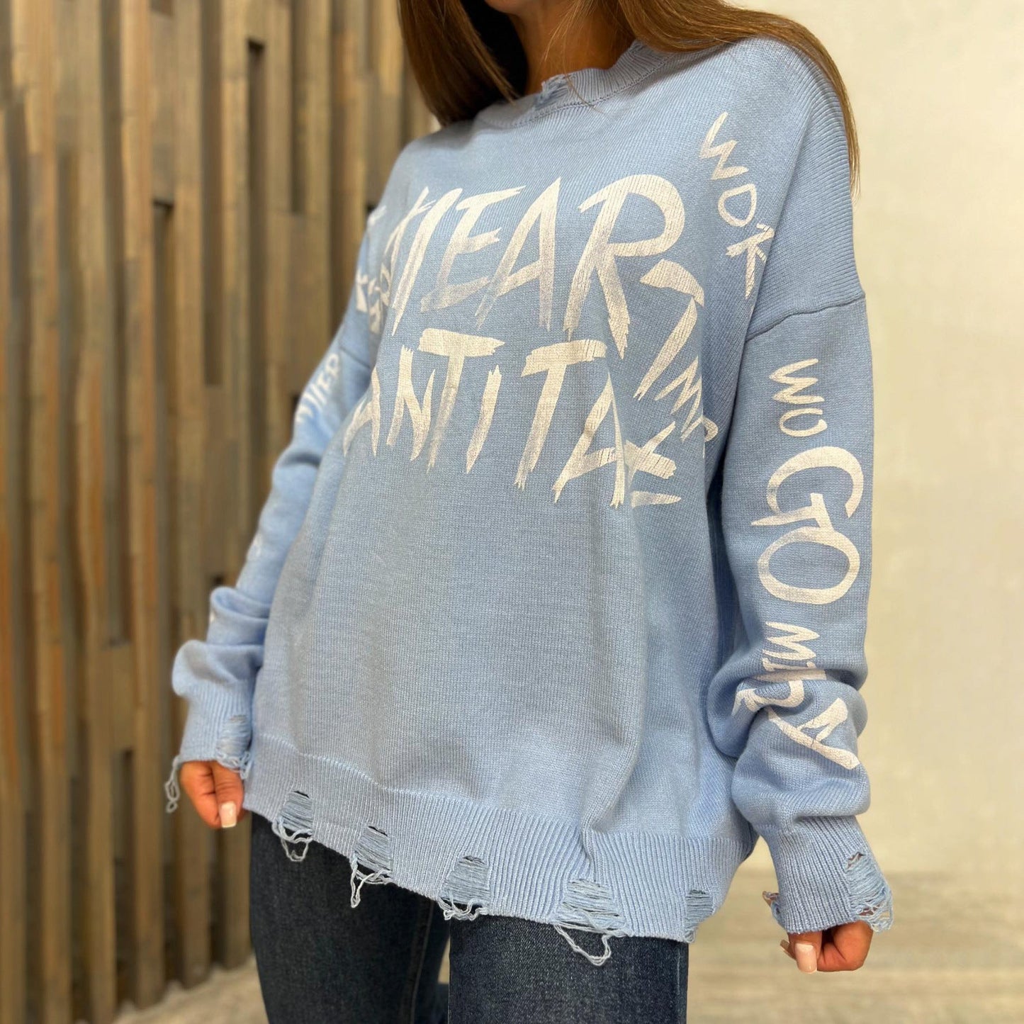 Women's oversized sweatshirt with creative lettering and fashionable ripped details NOVAE