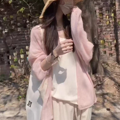 Women's fluffy cardigan with a relaxed fit and soft sleeves NOVAE