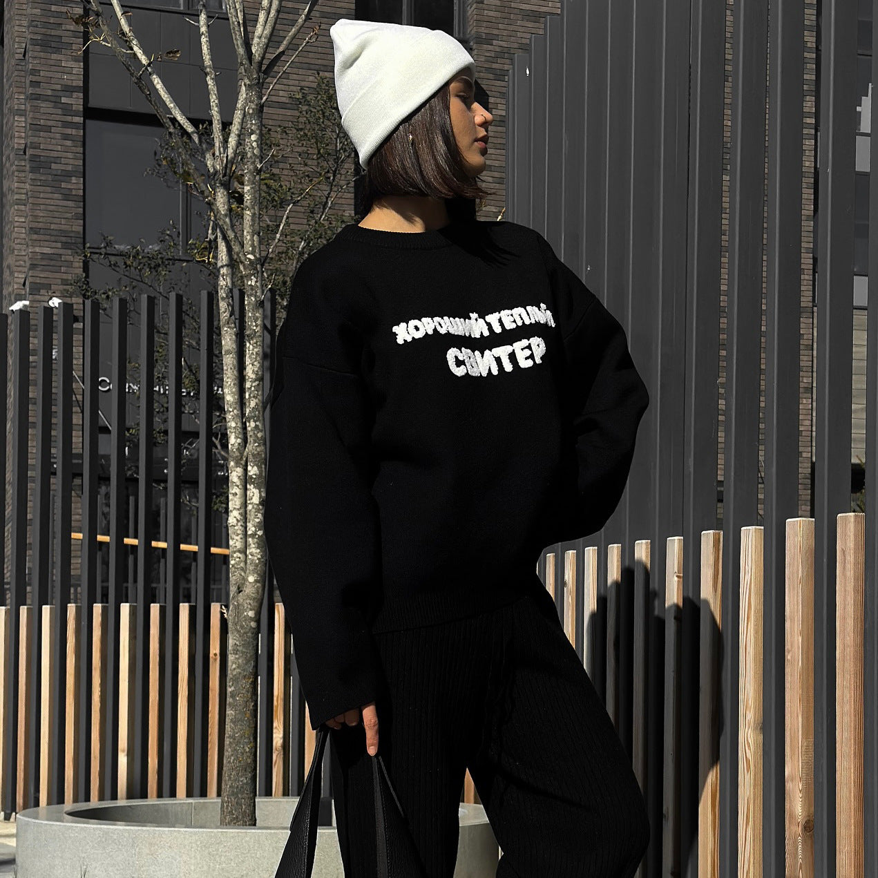 Women's casual oversized sweater with creative lettering and comfortable cut NOVAE