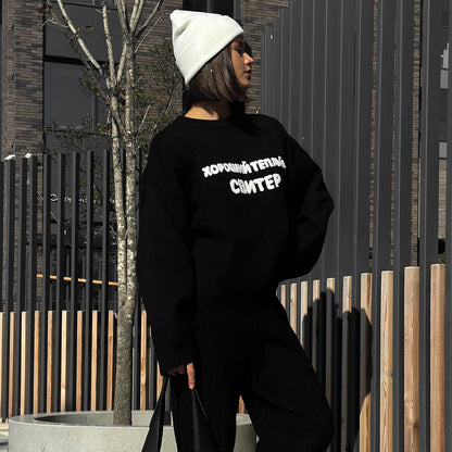 Women's casual oversized sweater with creative lettering and comfortable cut NOVAE