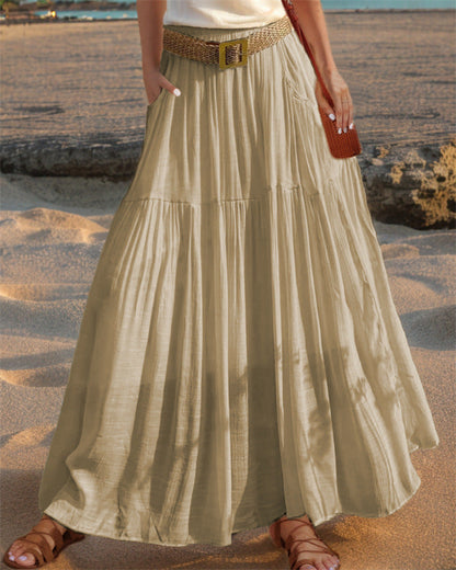 Women's wide-flared maxi skirt with elegant pleats and practical pockets NOVAE