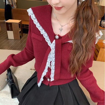 Women's cardigan with ruffled neckband and decorative buttons NOVAE