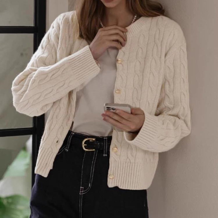 Women's cardigan with cable knit pattern and elegant button details NOVAE