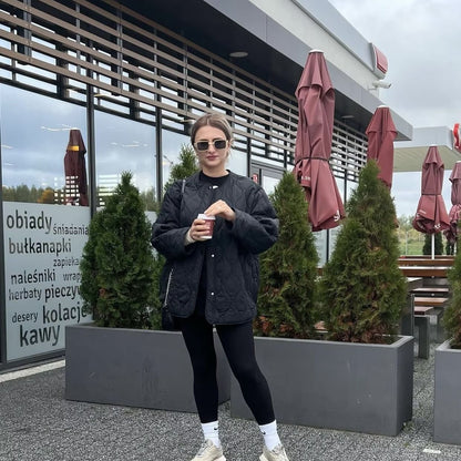 Women's quilted transitional jacket with practical pockets and round neckline NOVAE