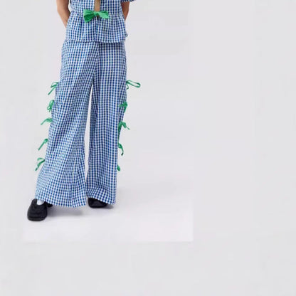 Women's wide-leg checked trousers with decorative lacing details NOVAE