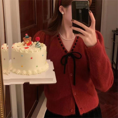 Women's cozy cardigan with contrasting buttons and elegant details NOVAE