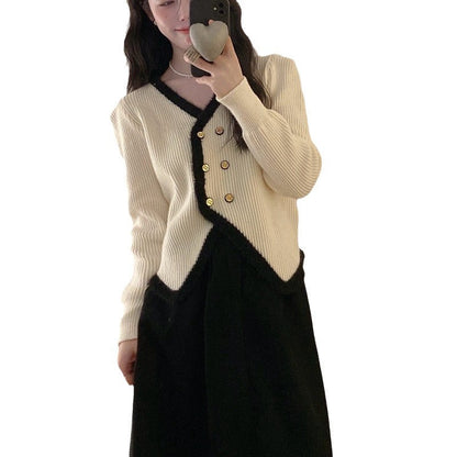 Women's cardigan with asymmetrical cut and gold button design NOVAE