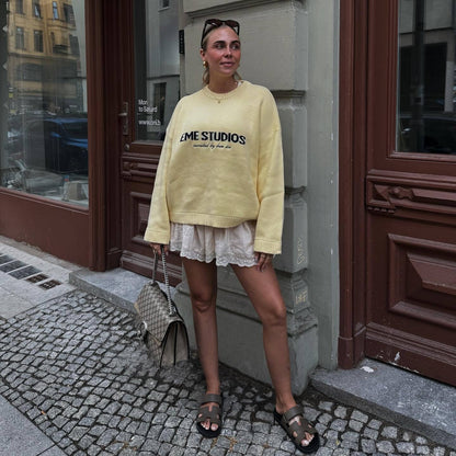 Women's oversized sweater with creative lettering NOVAE