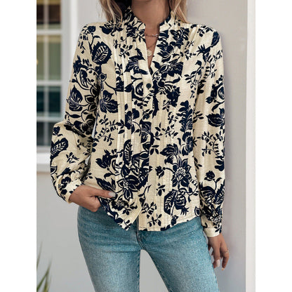Women's blouse with floral motifs and elegant ruching NOVAE