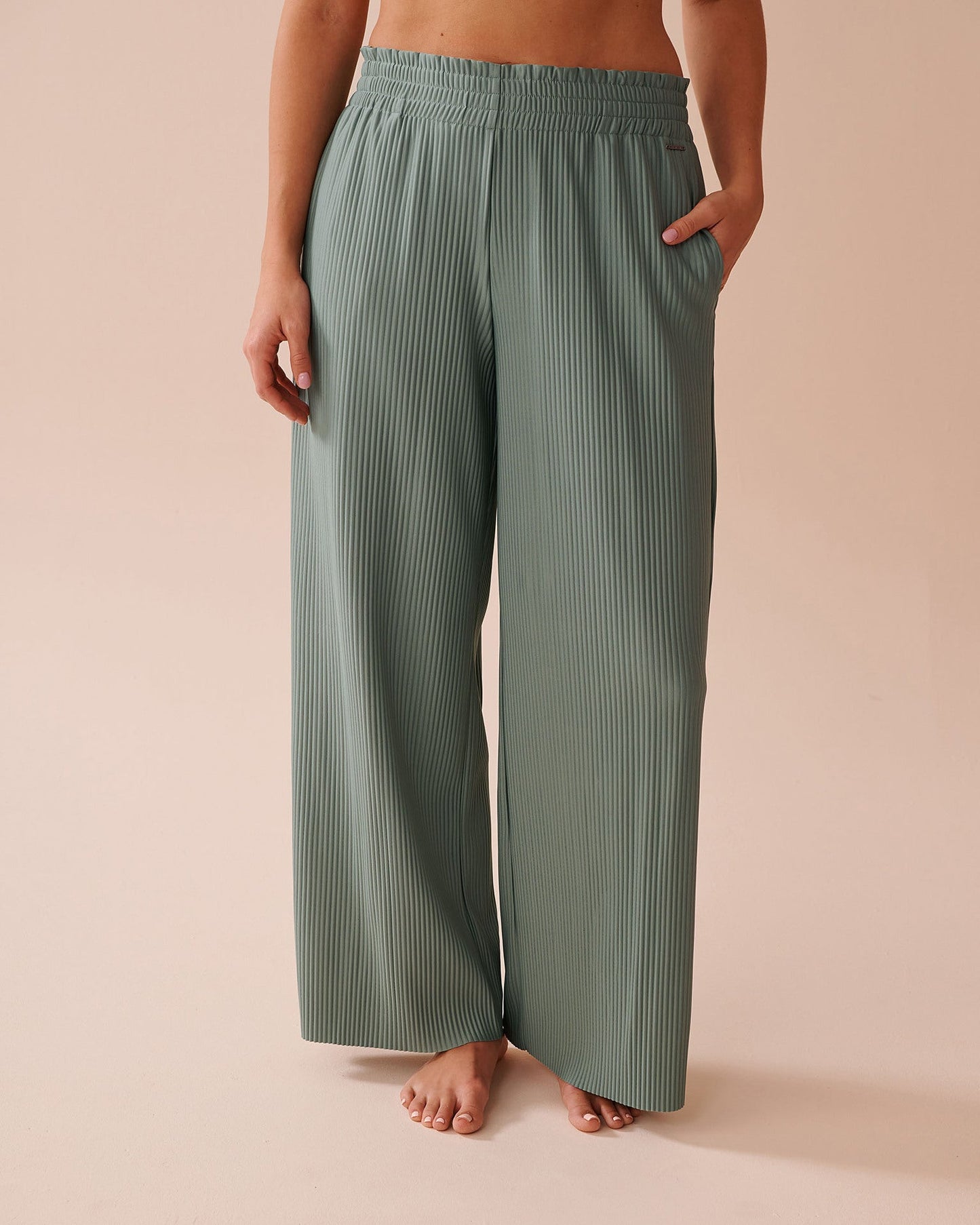 Women's pleated trousers with elasticated waistband and side pockets NOVAE