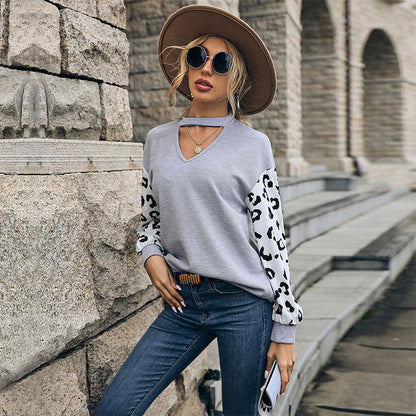 Women's sweatshirt with V-neck and trendy leopard sleeves NOVAE