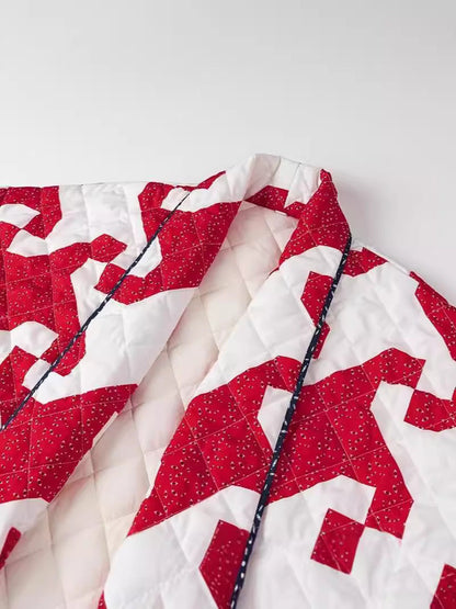 Women's quilted throw jacket with modern graphic design and generous pockets NOVAE