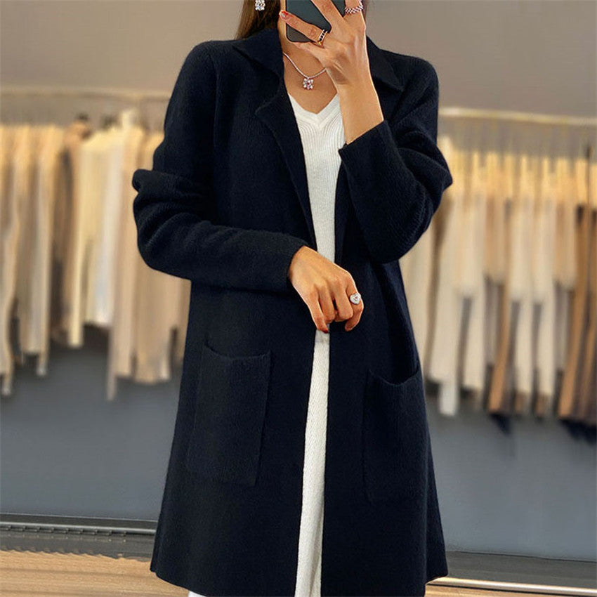 Women's oversized cardigan with deep V-neck and practical pockets NOVAE