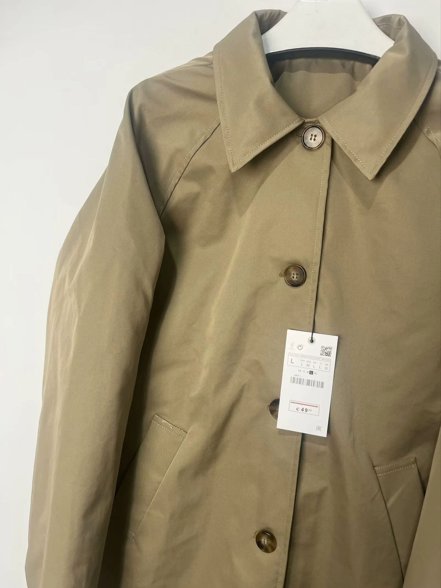 Women's fashionable transitional jacket with elegant stand-up collar and practical button details NOVAE