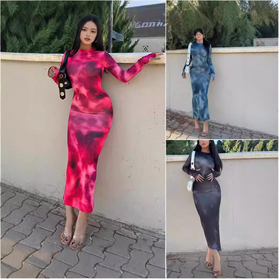 Women's figure-hugging maxi dress with long sleeves and a modern batik pattern NOVAE