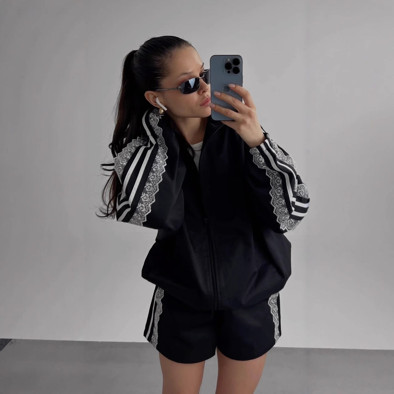 Women's sporty set with elegant lace appliqués NOVAE