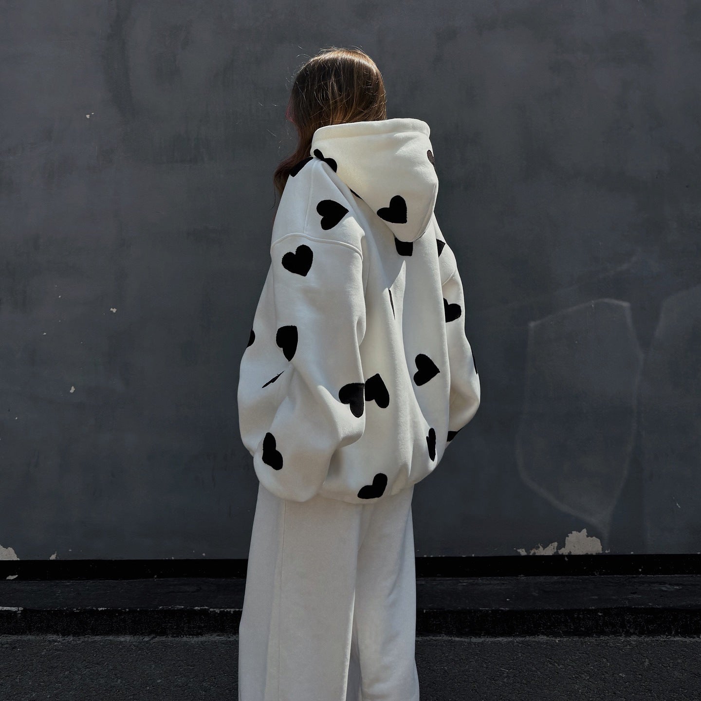 Women's hoodie with a creative heart motif and a casual oversized cut NOVAE