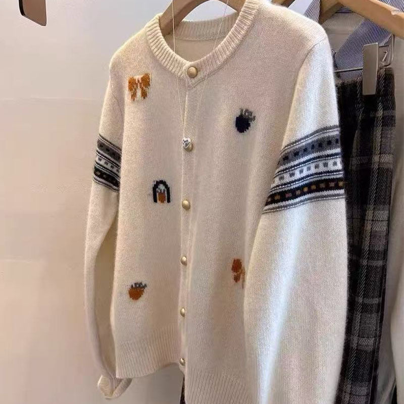 Women's cardigan with elegant appliqués and button details NOVAE