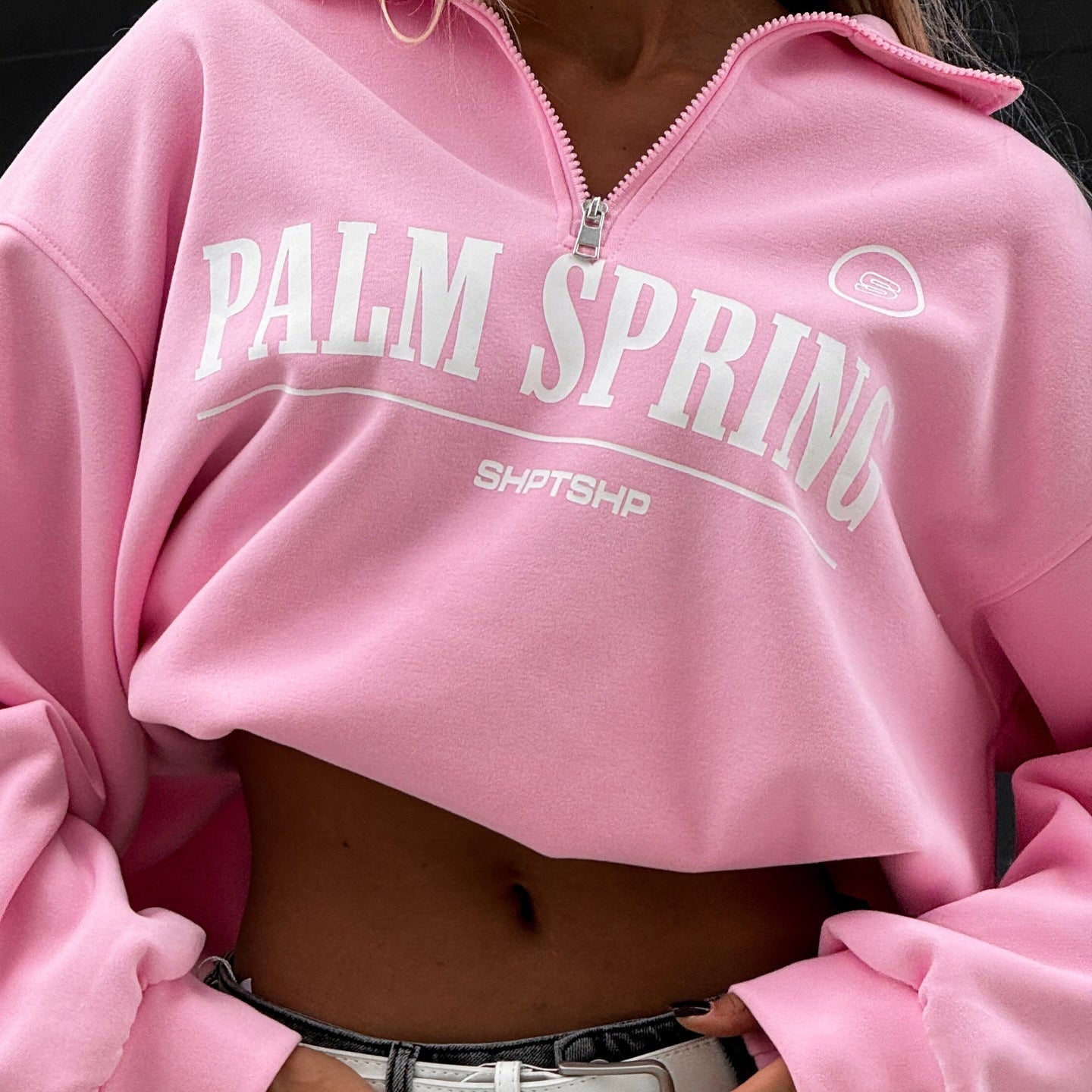 Women's cropped hooded top with eye-catching NOVAE logo