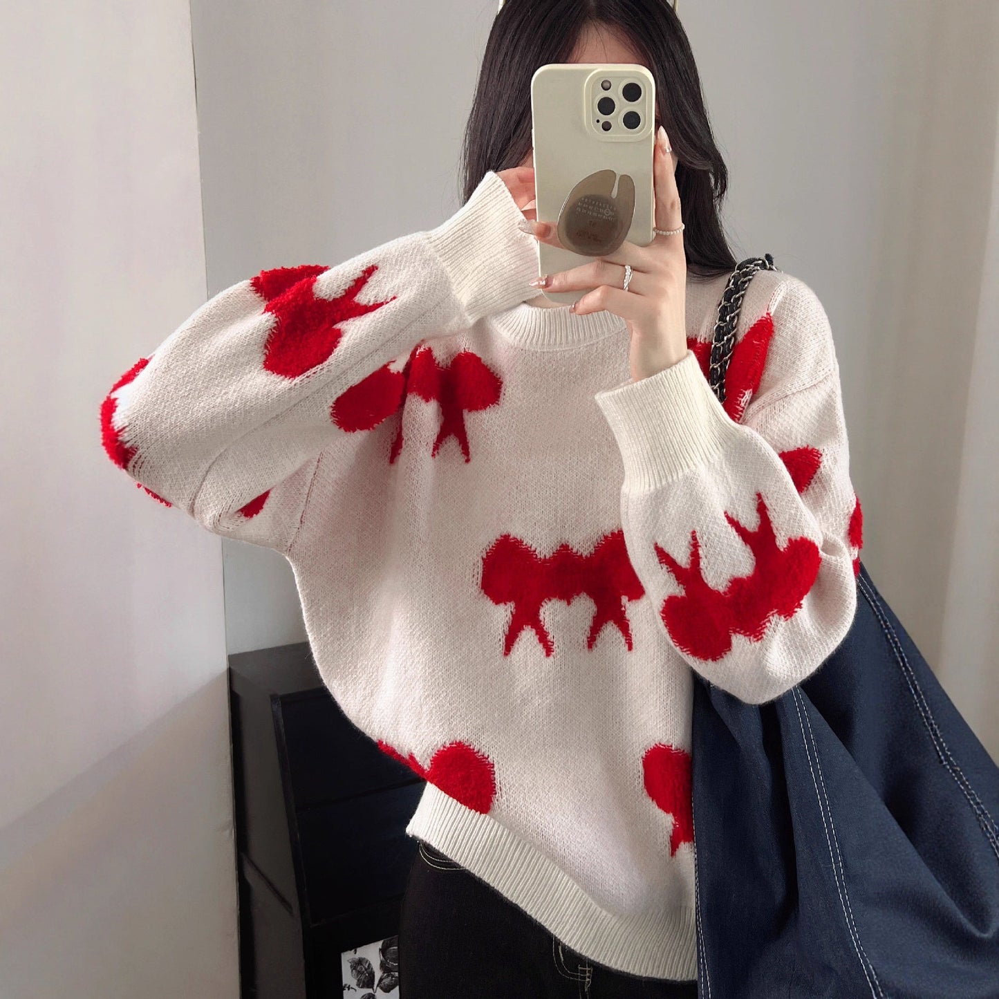 Women's Cozy Knit Sweater with Playful Bow Motif NOVAE
