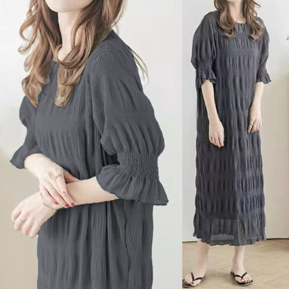 Women's casual maxi dress with elasticated puff sleeves and sophisticated textured design NOVAE