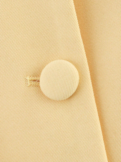 Women's elegant short blazer with a tailored fit and button details NOVAE