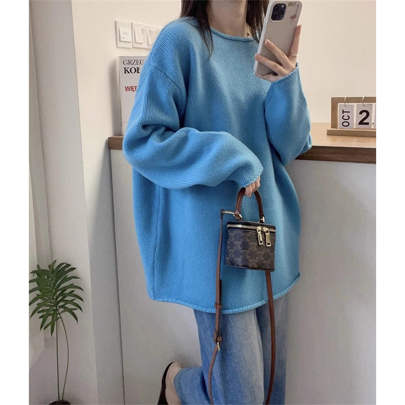 Women's oversized knit sweater with a relaxed fit and high collar NOVAE