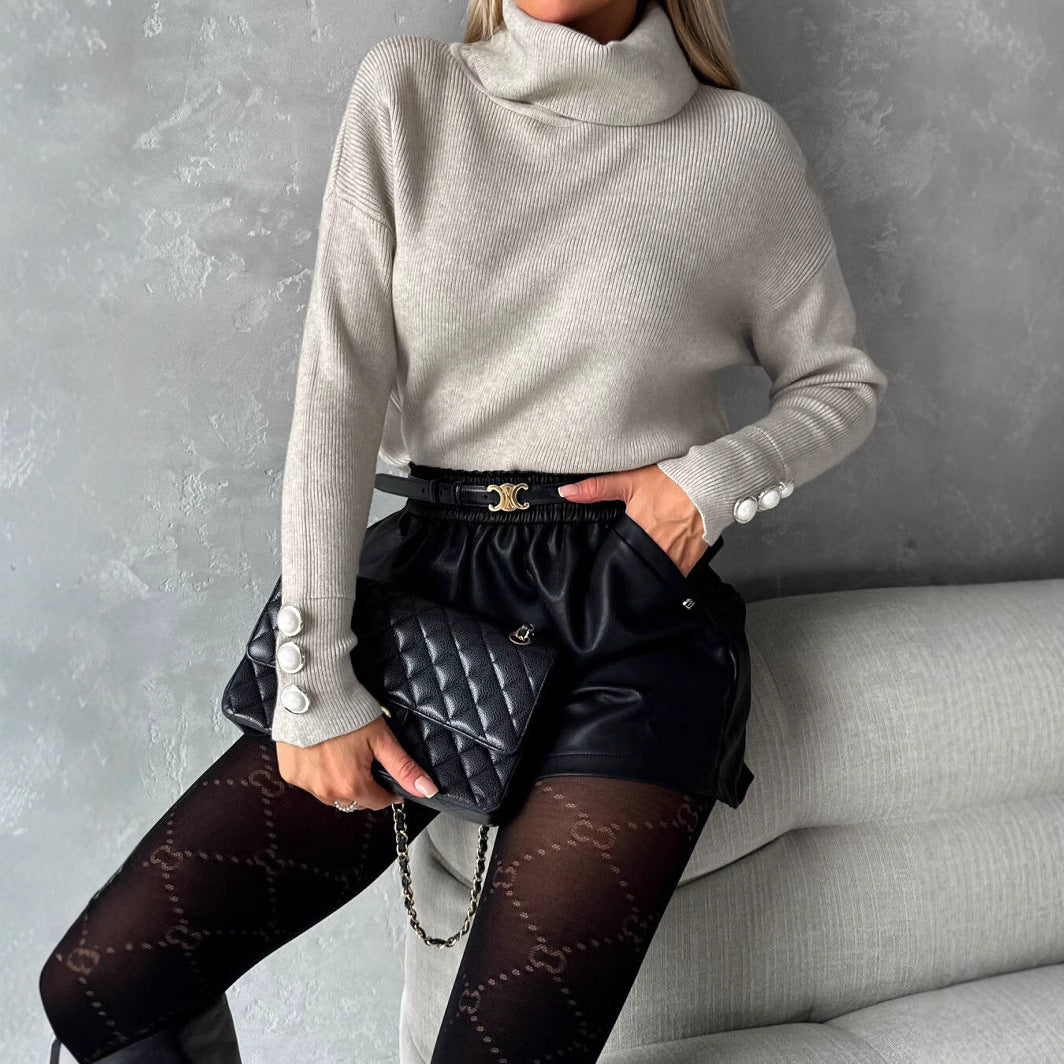 Women's knitted sweater with high collar and decorative buttons NOVAE