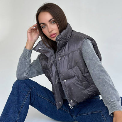 Women's quilted vest with fashionable accents and high collar NOVAE