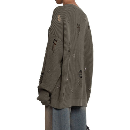 Women's casual sweater with fashionable ripped details and jewelry appliqués NOVAE