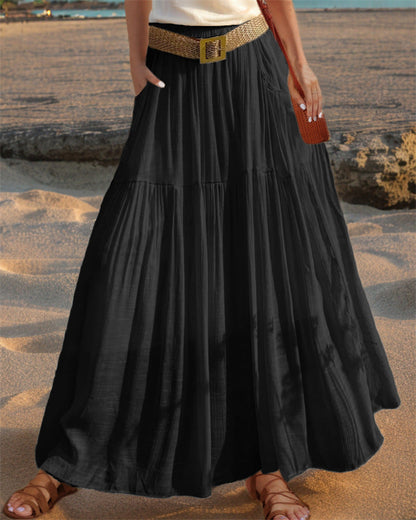 Women's wide-flared maxi skirt with elegant pleats and practical pockets NOVAE