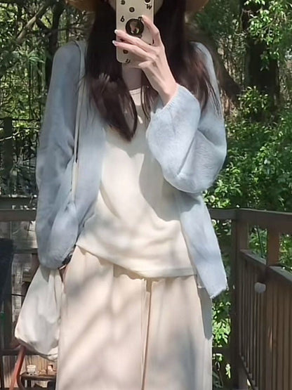 Women's fluffy cardigan with a relaxed fit and soft sleeves NOVAE