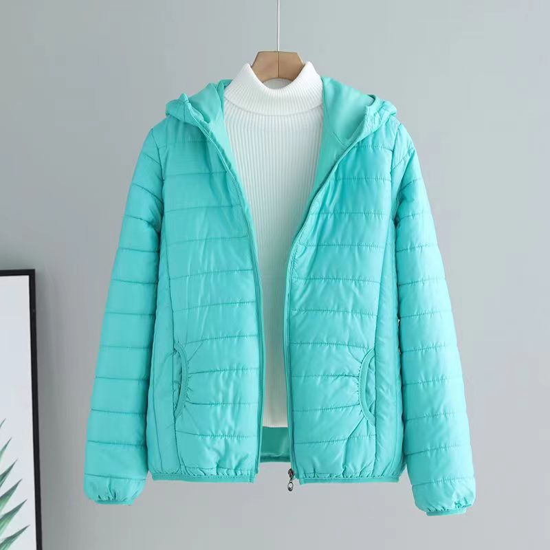 Women's quilted transitional jacket with practical pockets and hood NOVAE