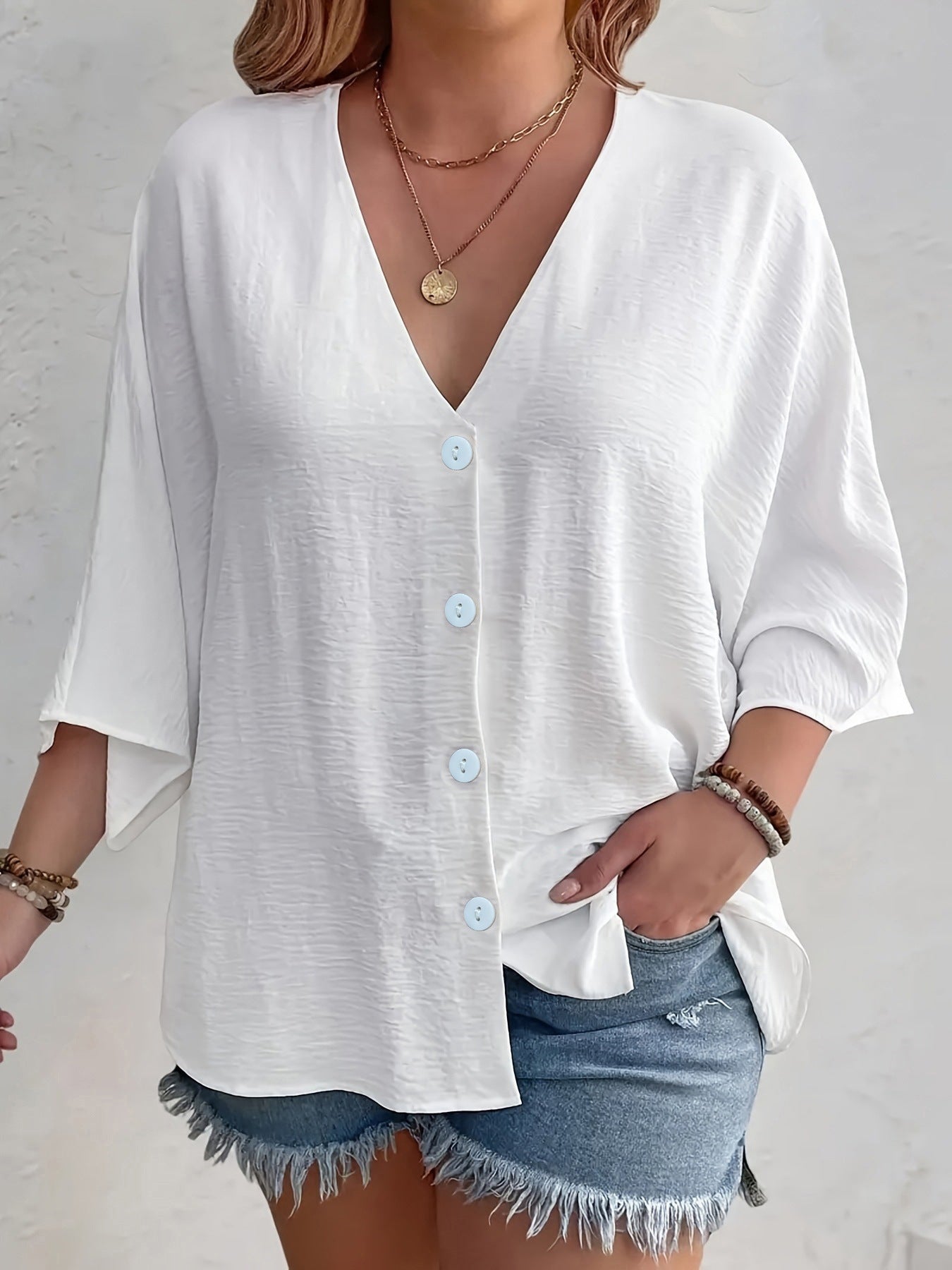 Women's flattering short-sleeved blouse with button placket and V-neck NOVAE