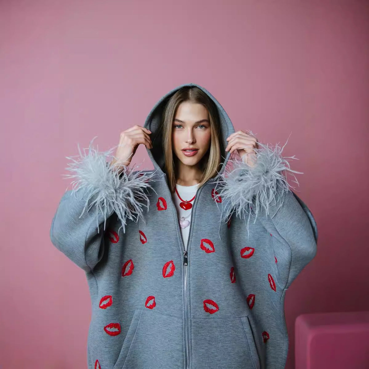 Women's hoodie with feathers and lip motif NOVAE