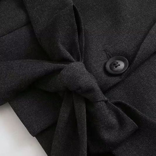 Women's fashionable short jacket with an elegant cut and practical details NOVAE