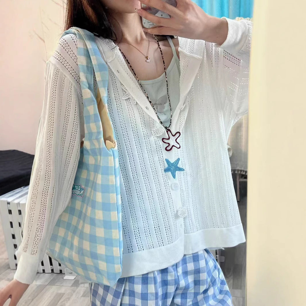 Women's cardigan with airy openwork pattern and practical pockets NOVAE