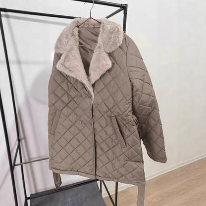 Women's quilted winter jacket with soft collar and practical pockets NOVAE