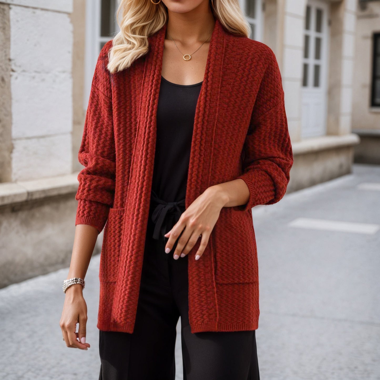 Women's cardigan with modern cable patterns and practical pockets NOVAE