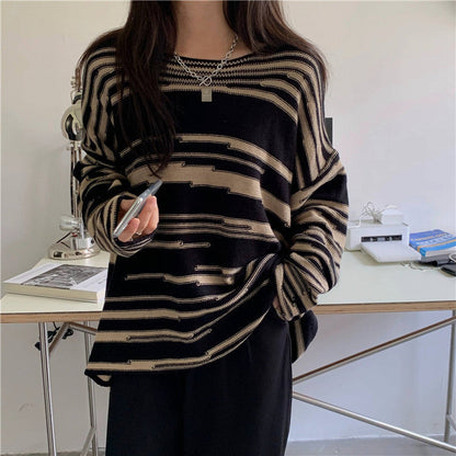 Women's knitted sweater with an elegant striped pattern and a relaxed fit NOVAE