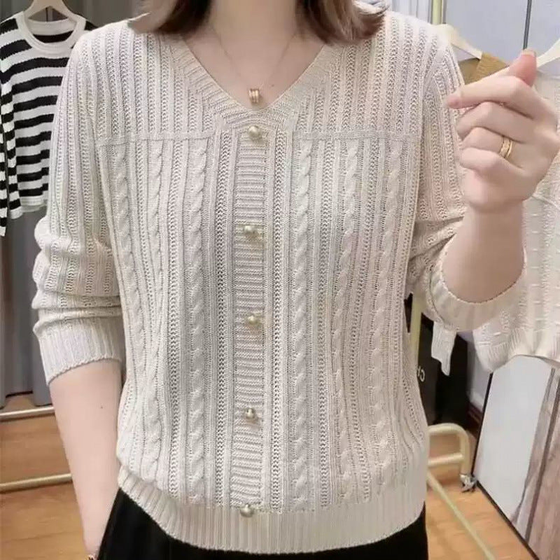 Women's cardigan with a fine cable knit pattern and elegant pearl buttons NOVAE